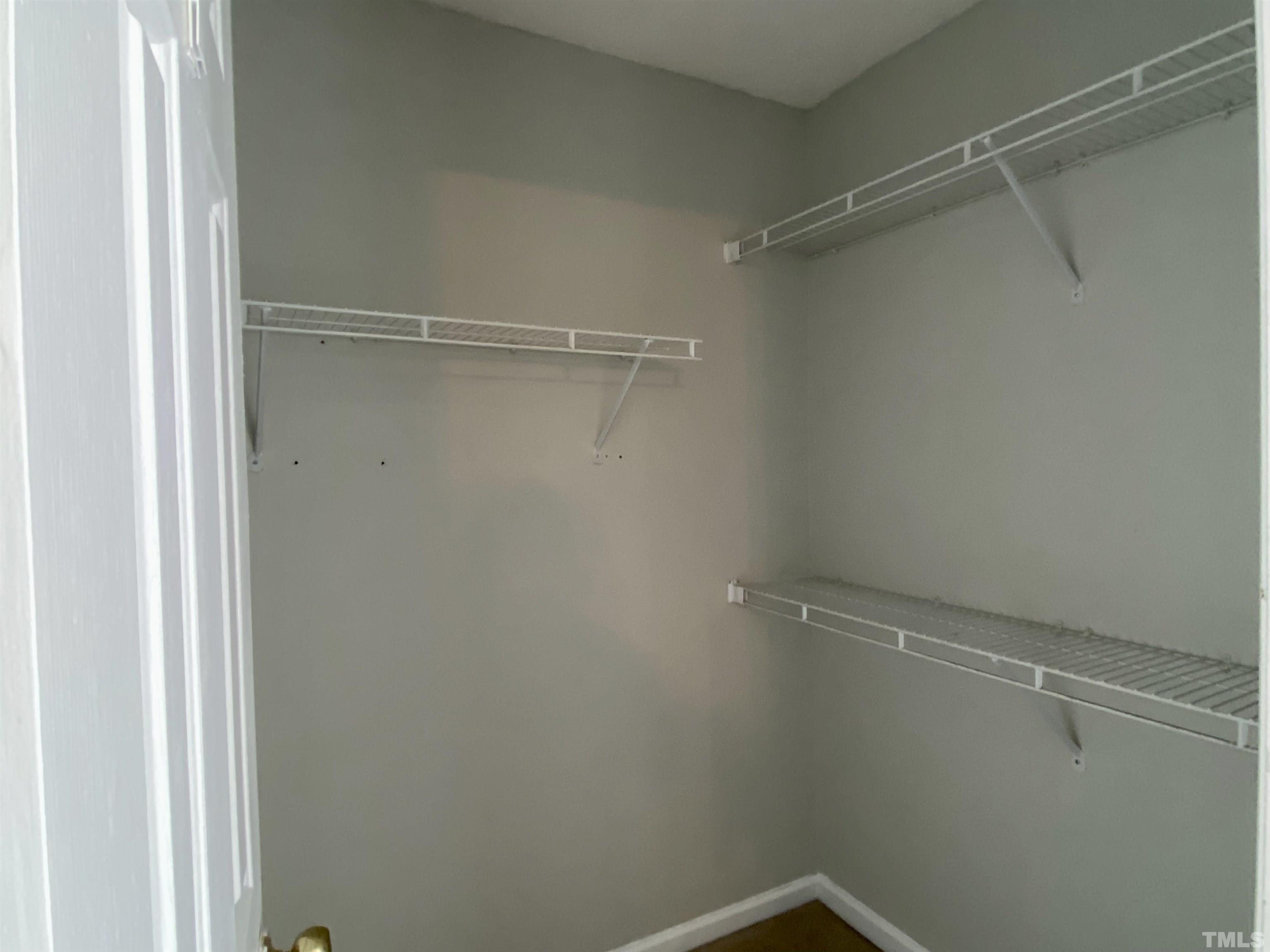 302 Bebington Drive Cary, NC 27513 - Photo 20 of 27 a view of an empty walk in closet