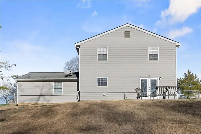 a front view of a house with garage