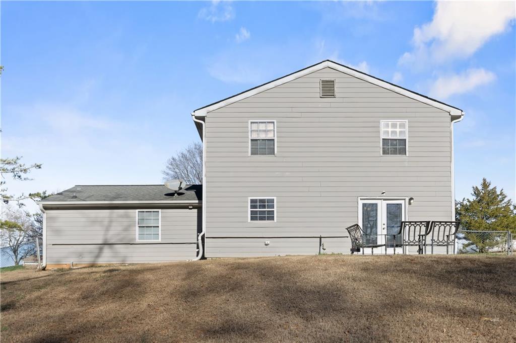 284 Oak Ridge Auburn, GA 30011 - Photo 12 of 13 a front view of a house with garage