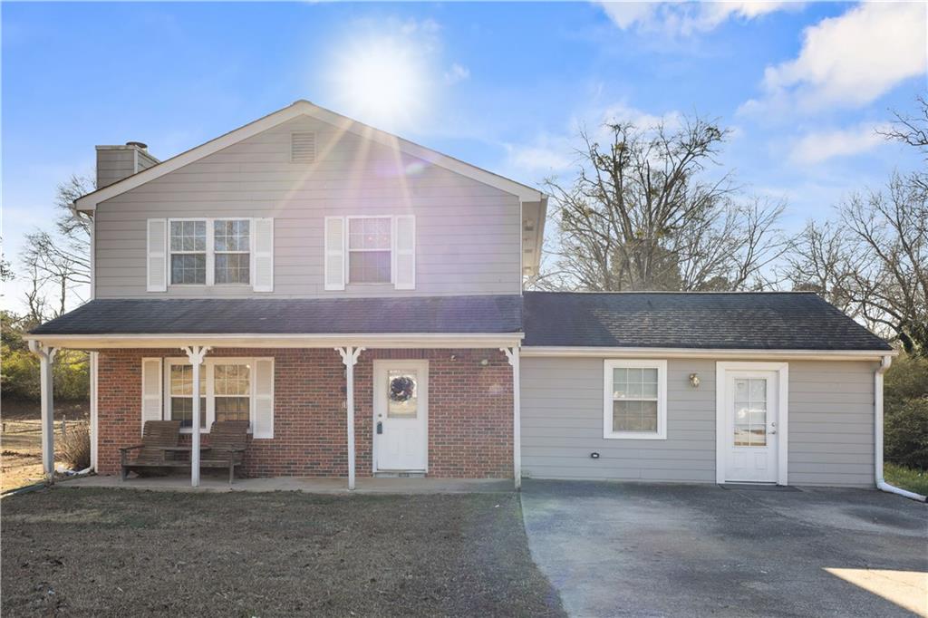 284 Oak Ridge Auburn, GA 30011 - Photo 13 of 13 front view of a house with a yard