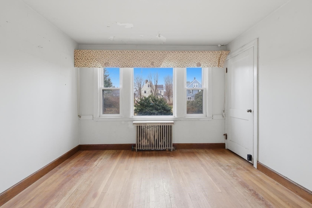 11 Clark Avenue Walpole, MA 02081 - Photo 12 of 25 an empty room with windows
