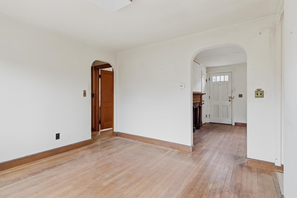 11 Clark Avenue Walpole, MA 02081 - Photo 13 of 25 an empty room with closet and wooden floor