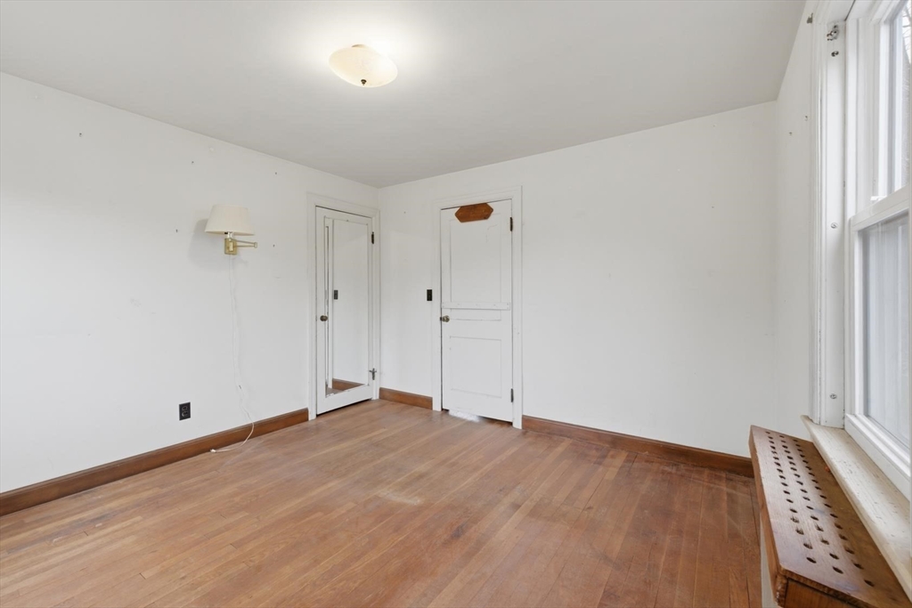 11 Clark Avenue Walpole, MA 02081 - Photo 14 of 25 wooden floor in an empty room
