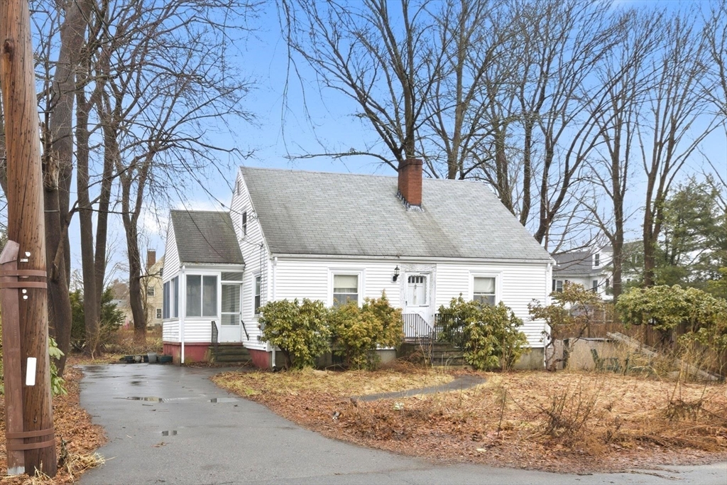 11 Clark Avenue Walpole, MA 02081 - Photo 2 of 25 a front view of a house with a yard