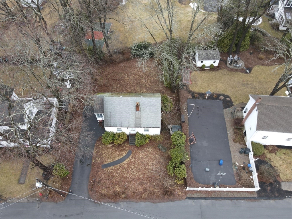 11 Clark Avenue Walpole, MA 02081 - Photo 21 of 25 front view of a house with a yard
