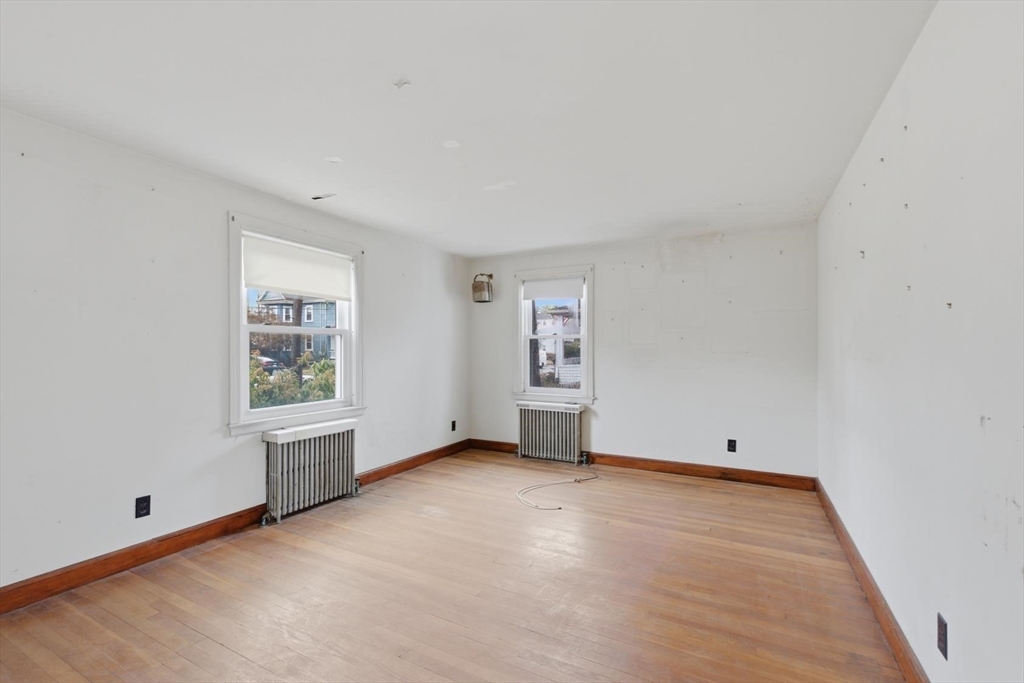 11 Clark Avenue Walpole, MA 02081 - Photo 10 of 25 an empty room with windows