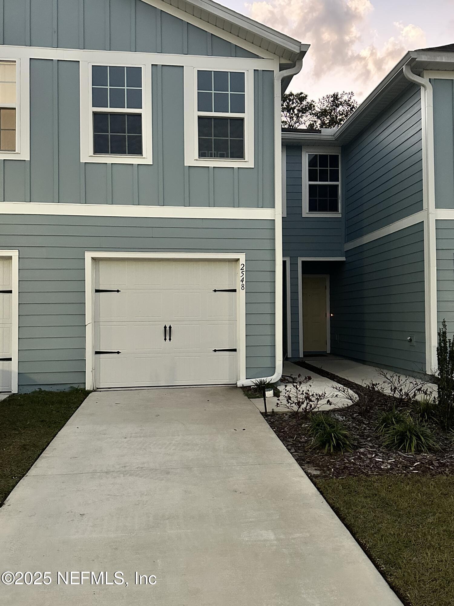 2548 Sadler Trce Way Jacksonville, FL 32210 - Photo 1 of 12 a front view of a house
