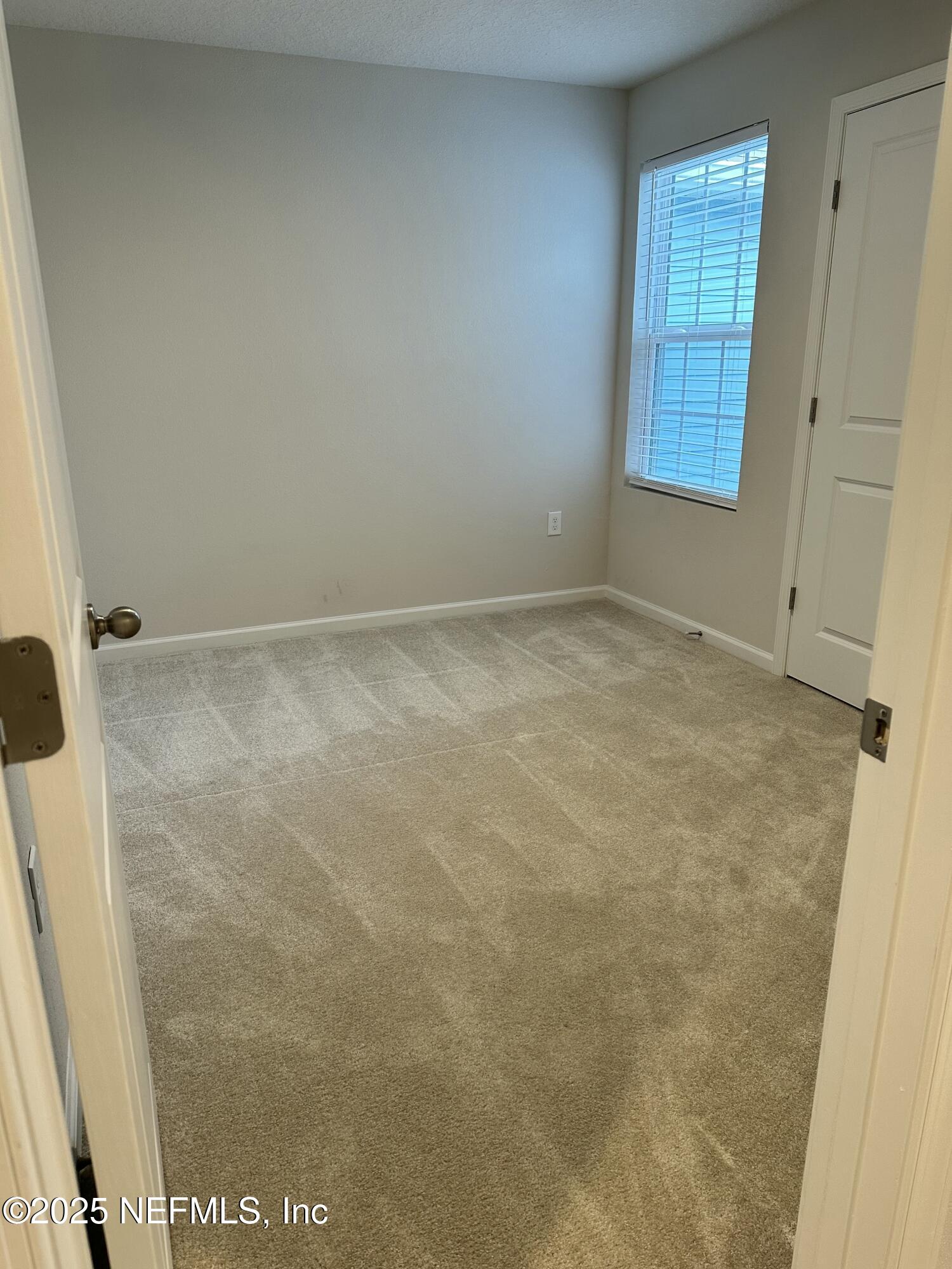 2548 Sadler Trce Way Jacksonville, FL 32210 - Photo 6 of 12 a view of an empty room