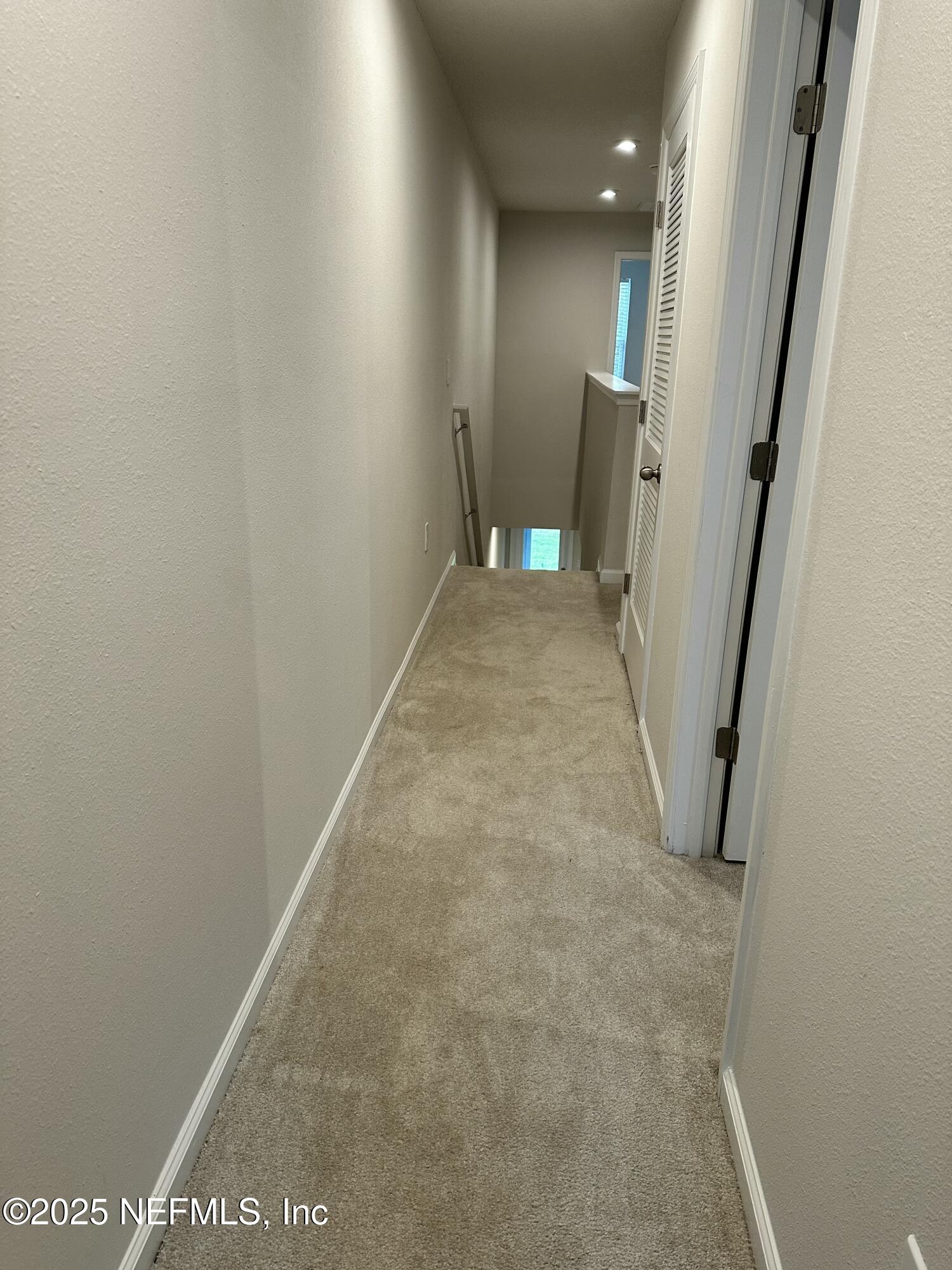 2548 Sadler Trce Way Jacksonville, FL 32210 - Photo 8 of 12 a view of a hallway