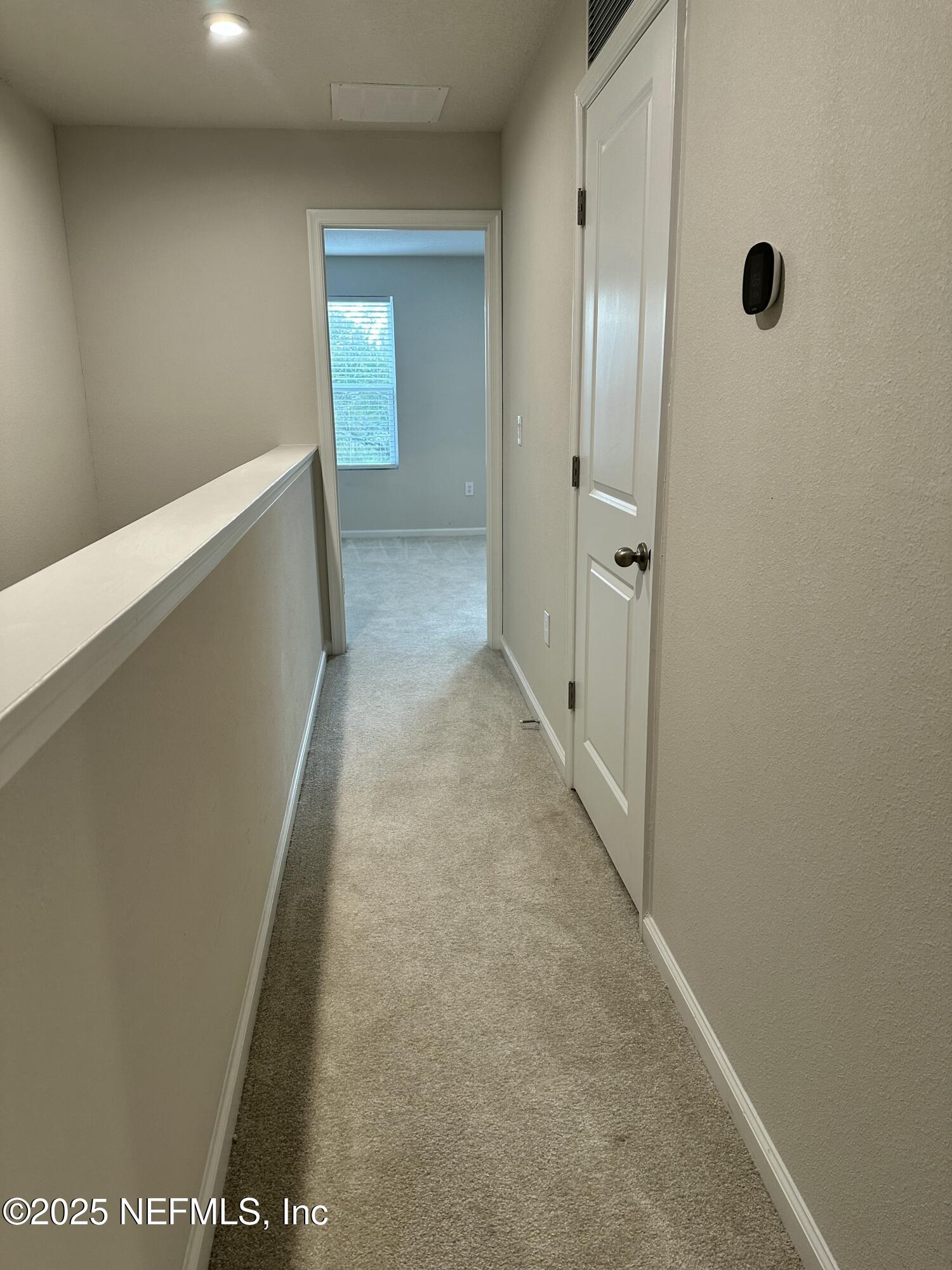 2548 Sadler Trce Way Jacksonville, FL 32210 - Photo 9 of 12 a view of hallway