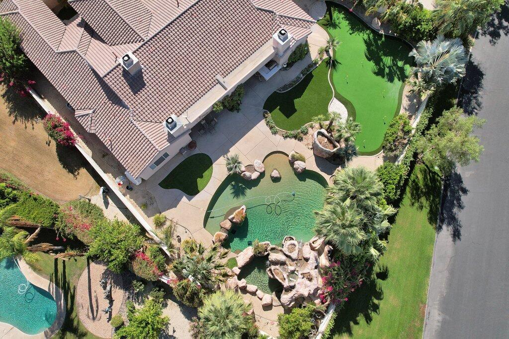 8 MacBeth Court Rancho Mirage, CA 92270 - Photo 46 of 46 an aerial view of a house with a yard and garden