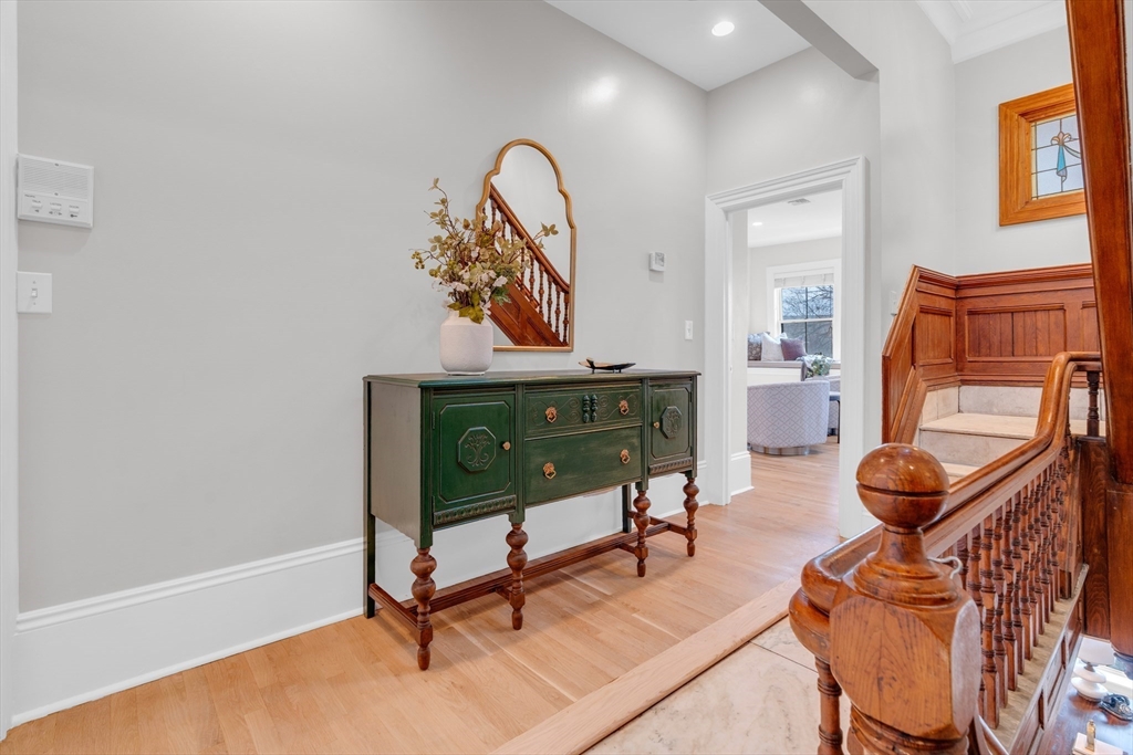 69 Rutland Street, Unit 3 Boston, MA 02118 - Photo 19 of 39 a living room with furniture and a mirror