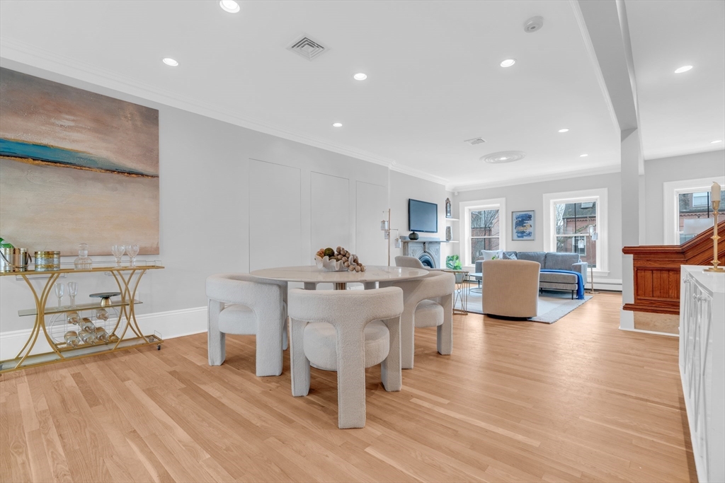 69 Rutland Street, Unit 3 Boston, MA 02118 - Photo 2 of 39 a view of a dining hall with furniture and wooden floor