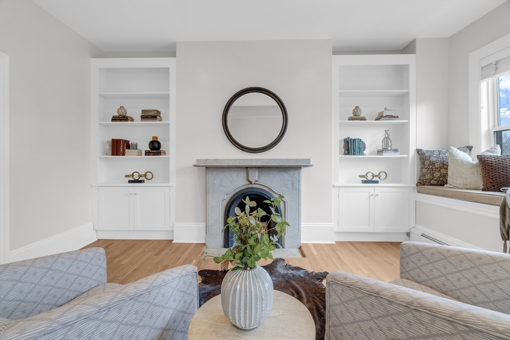 69 Rutland Street, Unit 3 Boston, MA 02118 - Photo 22 of 39 a living room with furniture and a fireplace