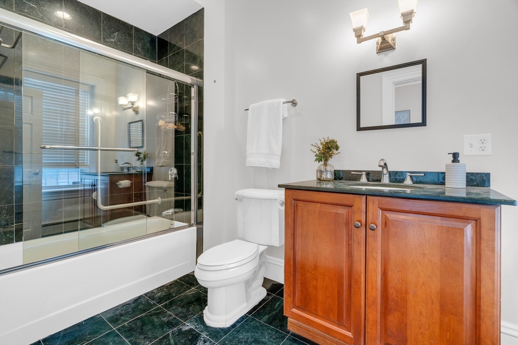 69 Rutland Street, Unit 3 Boston, MA 02118 - Photo 29 of 39 a bathroom with a sink toilet and shower