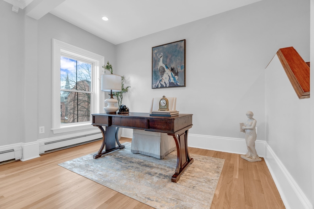 69 Rutland Street, Unit 3 Boston, MA 02118 - Photo 30 of 39 a view of a workspace with furniture window and wooden floor