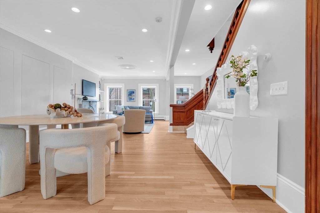 69 Rutland Street, Unit 3 Boston, MA 02118 - Photo 3 of 39 a living room with furniture and a wooden floor