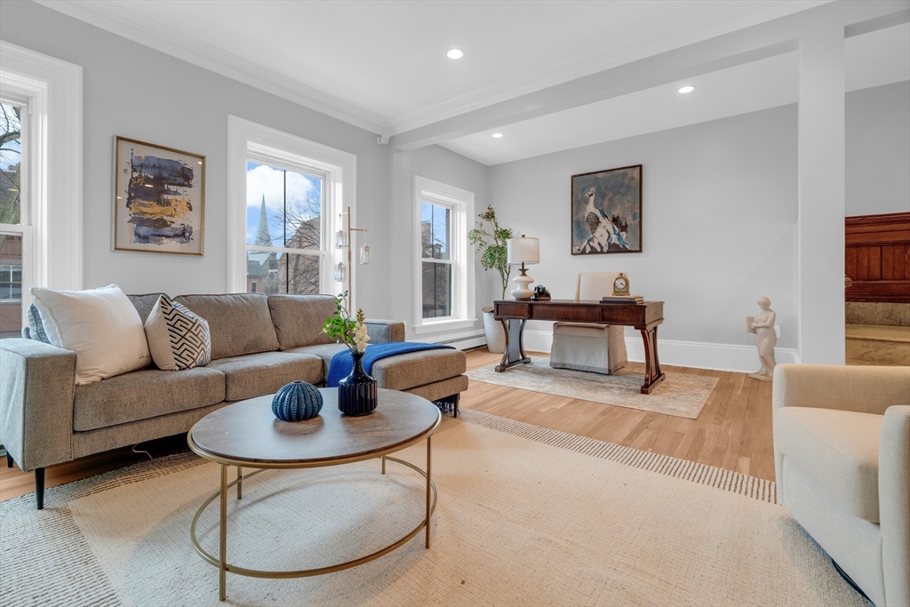 69 Rutland Street, Unit 3 Boston, MA 02118 - Photo 7 of 39 a living room with furniture and a table