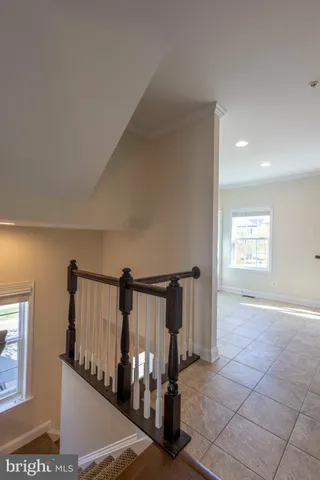 a view of a hallway with windows