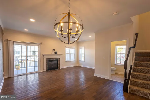 a bathroom with a toilet a sink and a mirror