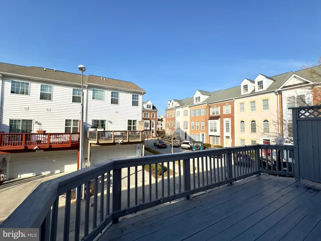 a view of a balcony with chairs
