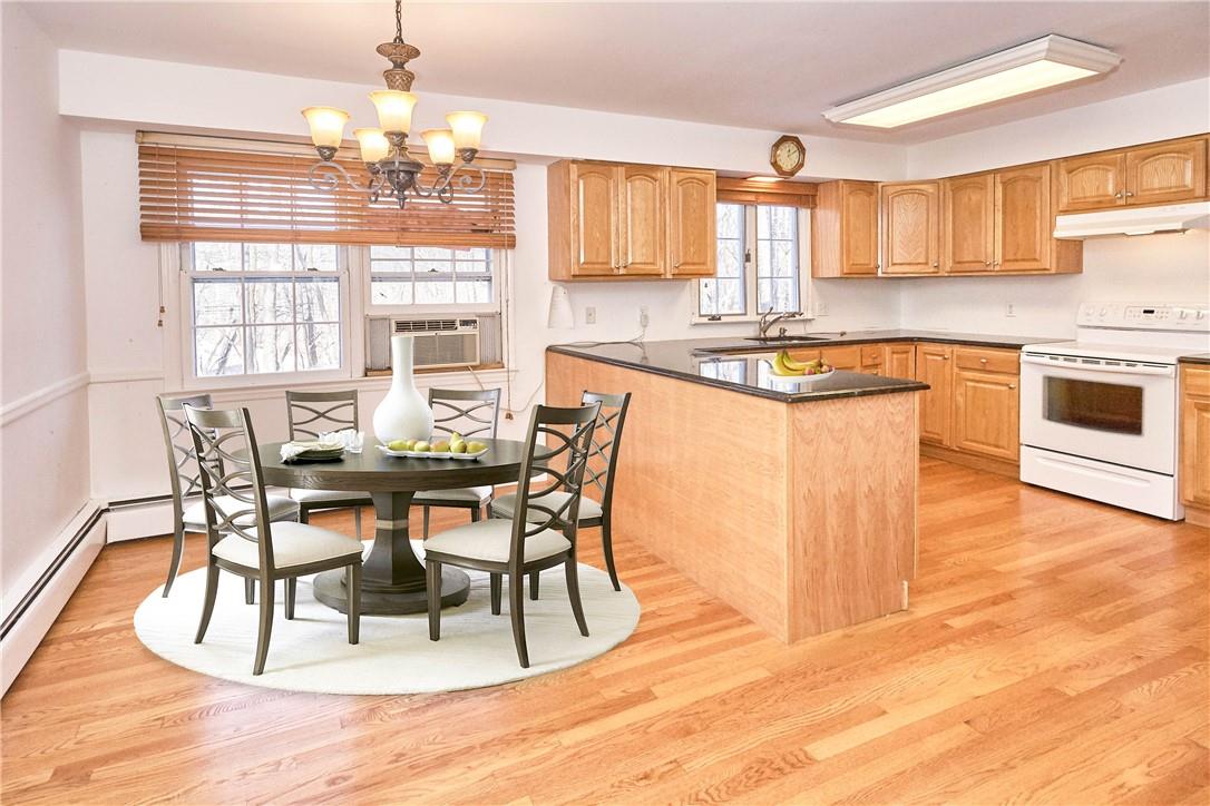 1 Old Rte 202D Suffern, NY 10901 - Photo 1 of 1 a view of a dining room with furniture and wooden floor