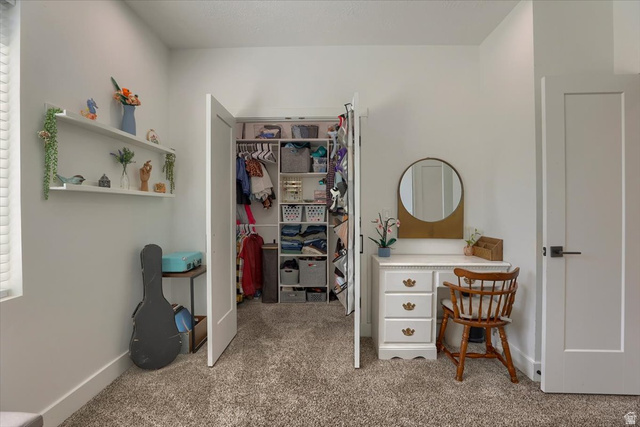 828 South Deer Road Tooele, UT 84074 - Photo 35 of 51 Spacious closet with bi-fold doors and integrated shelving system