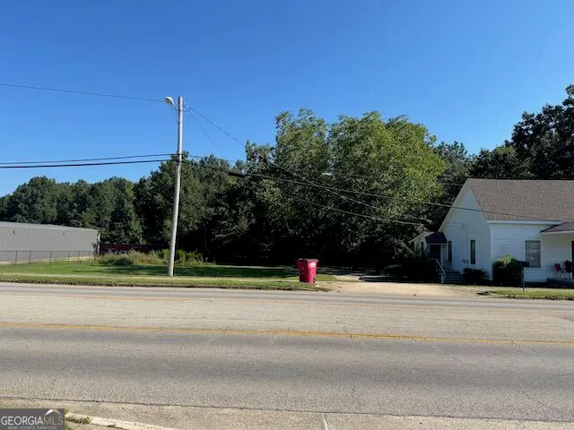 a view of street with tall buildings