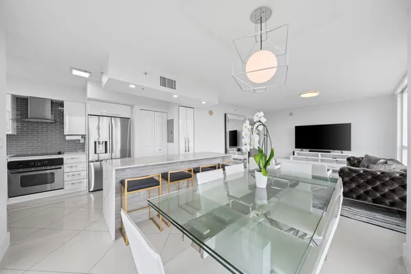 a view of a dining room with furniture