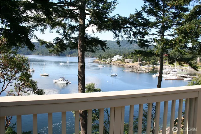 a view of a lake from a balcony