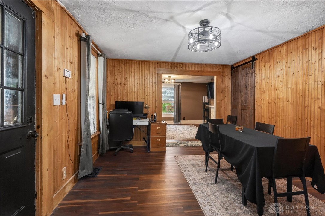 1726 Morgan Street Springfield, OH 45503 - Photo 8 of 30 This versatile space features rich wood paneling, wood flooring, and a unique lighting fixture.