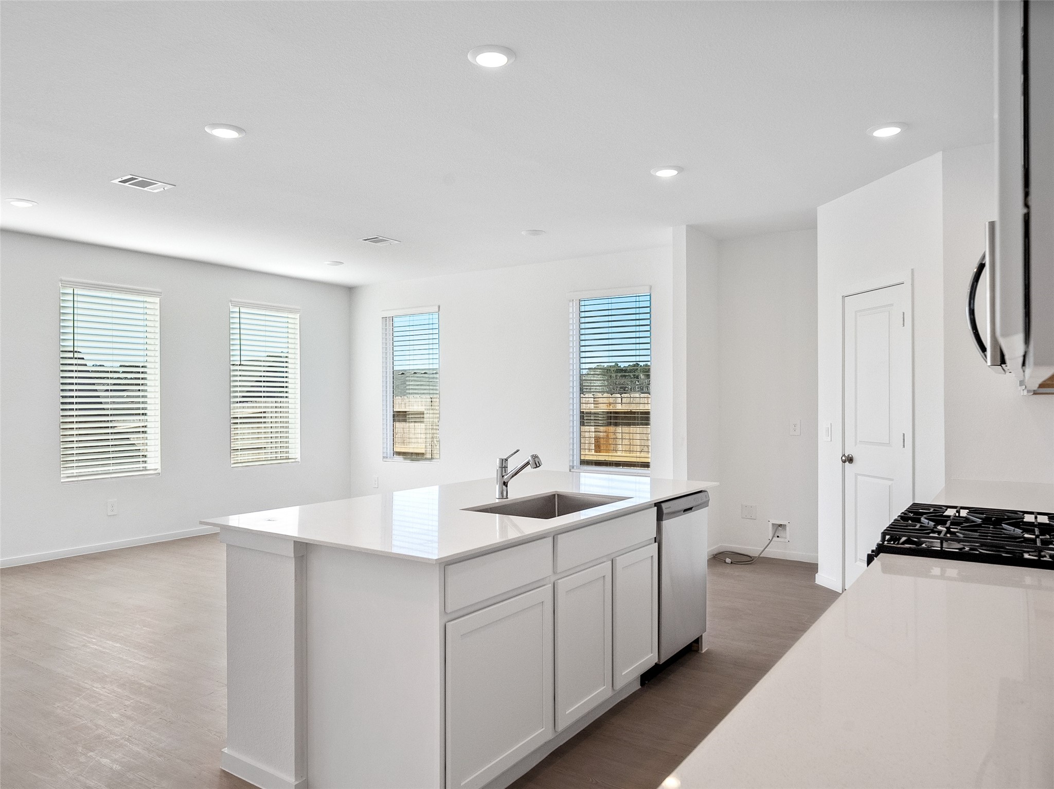 826 Ridgewood Cliffs Willis, TX 77378 - Photo 14 of 26 a kitchen with sink and window