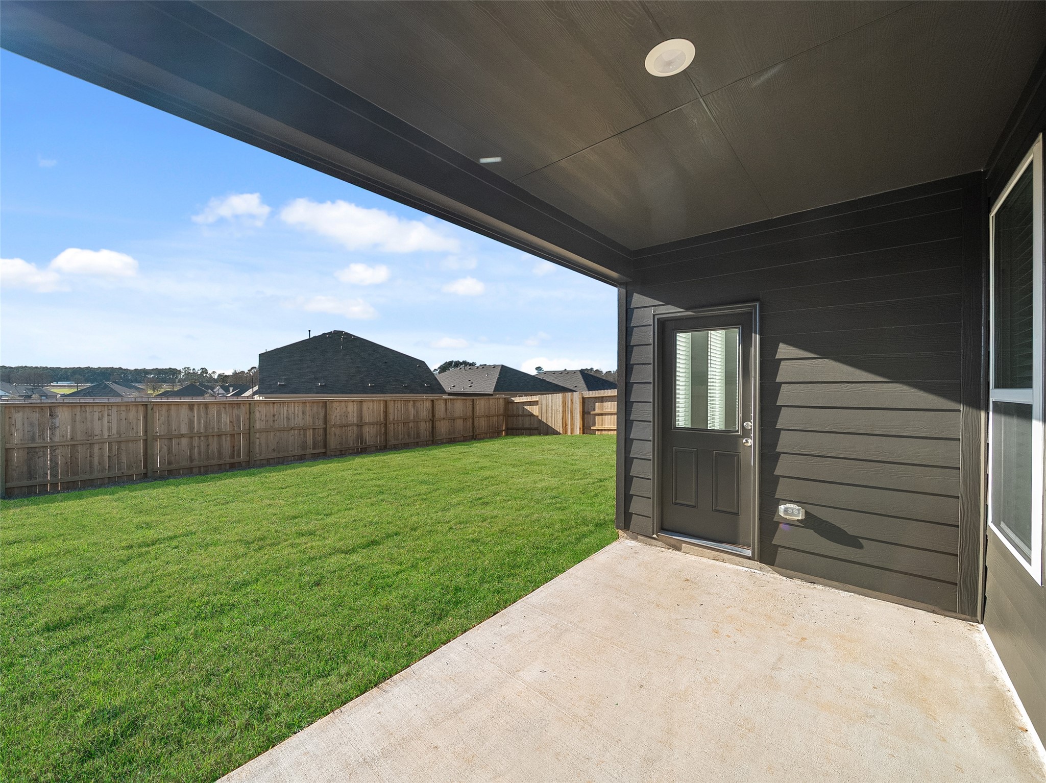 826 Ridgewood Cliffs Willis, TX 77378 - Photo 21 of 26 a view of a backyard