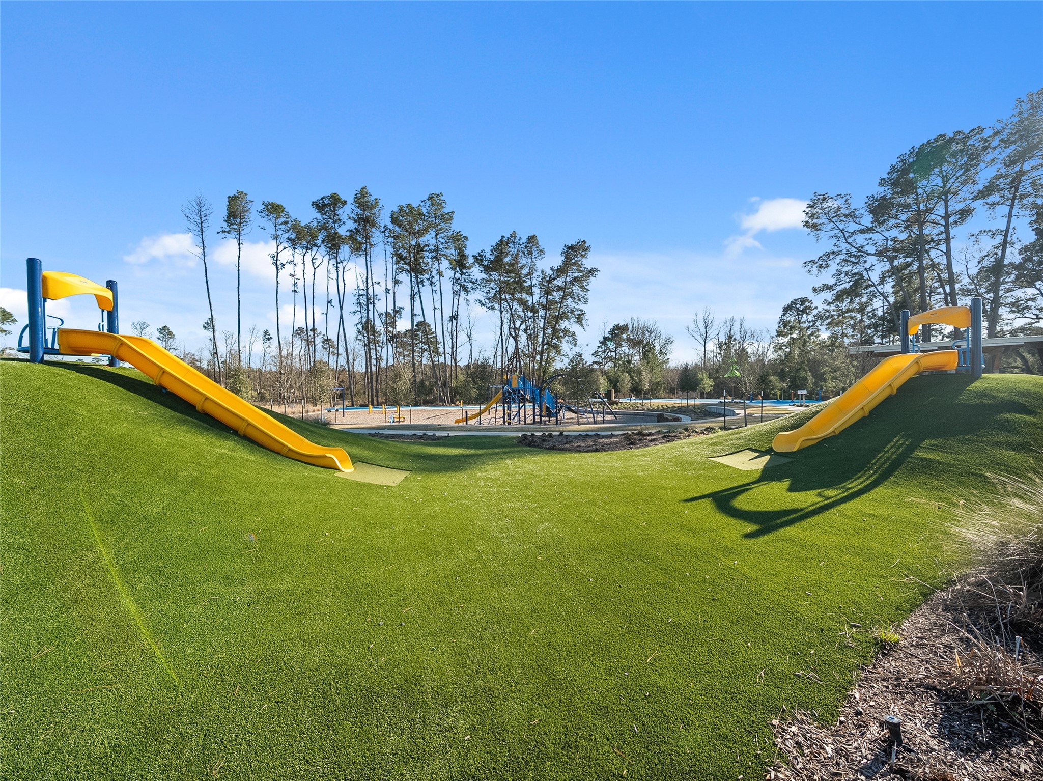 826 Ridgewood Cliffs Willis, TX 77378 - Photo 24 of 26 a view of a lake with a yard