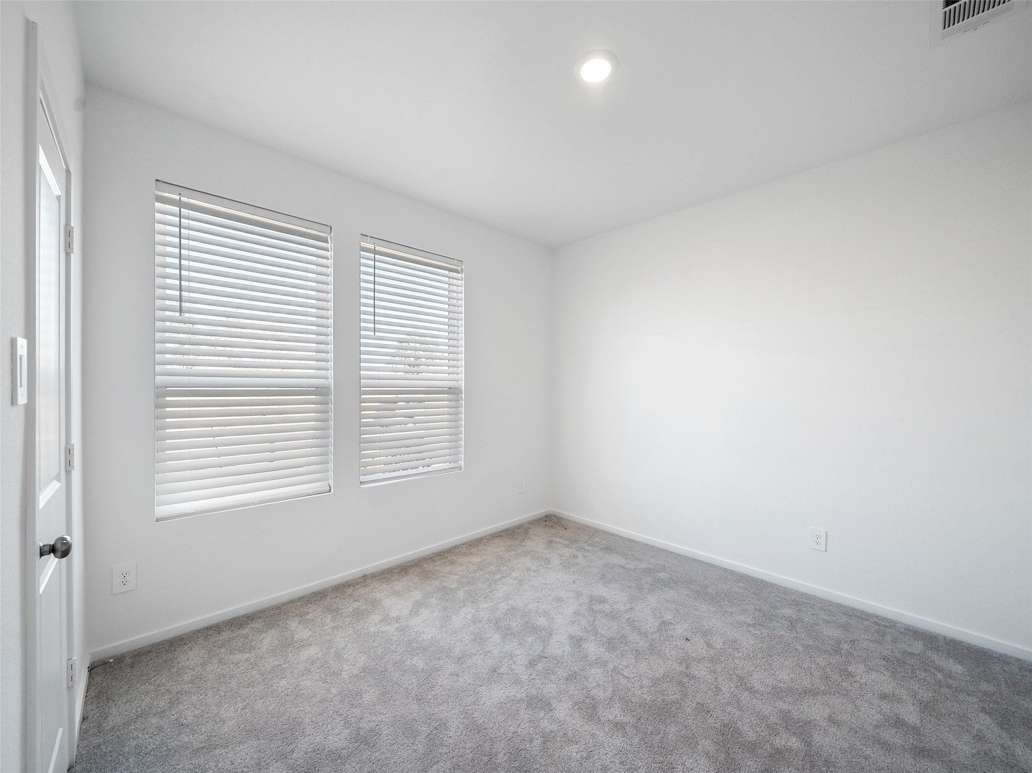 826 Ridgewood Cliffs Willis, TX 77378 - Photo 3 of 26 an empty room with a window