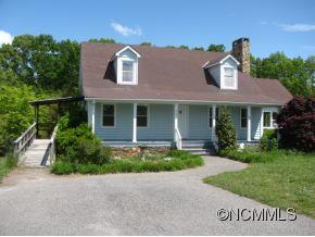 963 McEntire Road Tryon, NC 28782 - Photo 1 of 9 front view of a house with a yard