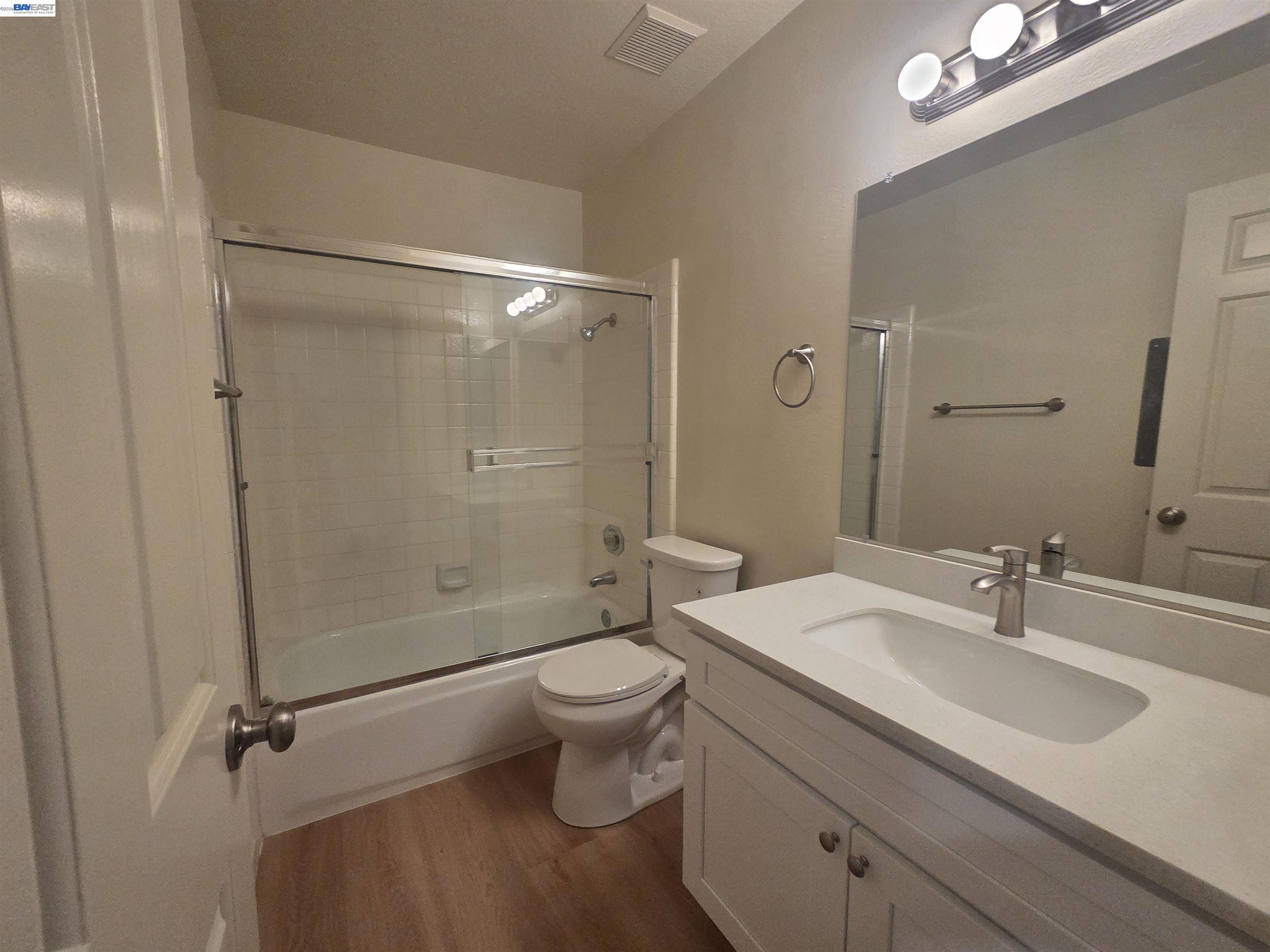 San Ramon San Ramon, CA 94582 - Photo 17 of 30 a bathroom with a sink toilet a mirror and shower