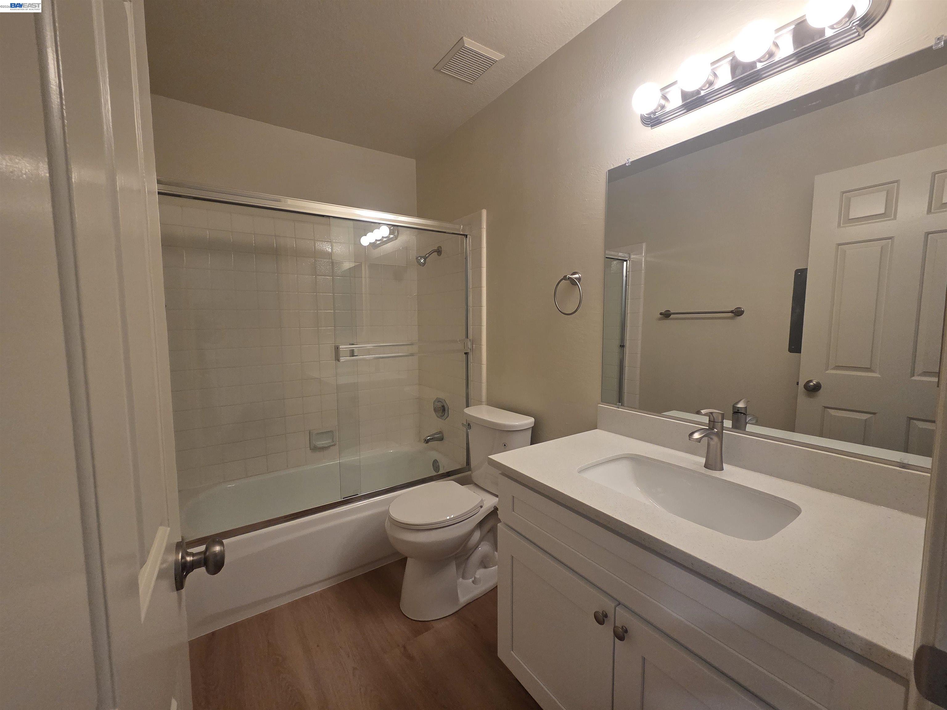 San Ramon San Ramon, CA 94582 - Photo 18 of 30 a bathroom with a sink toilet a mirror and shower