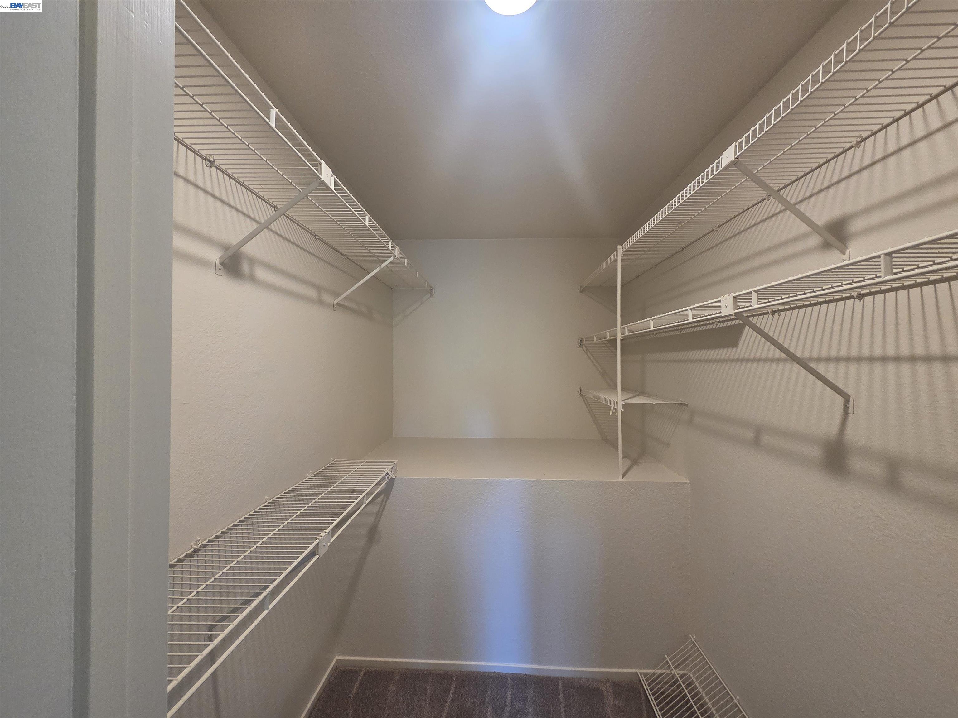 San Ramon San Ramon, CA 94582 - Photo 24 of 30 a view of walk in closet with empty racks