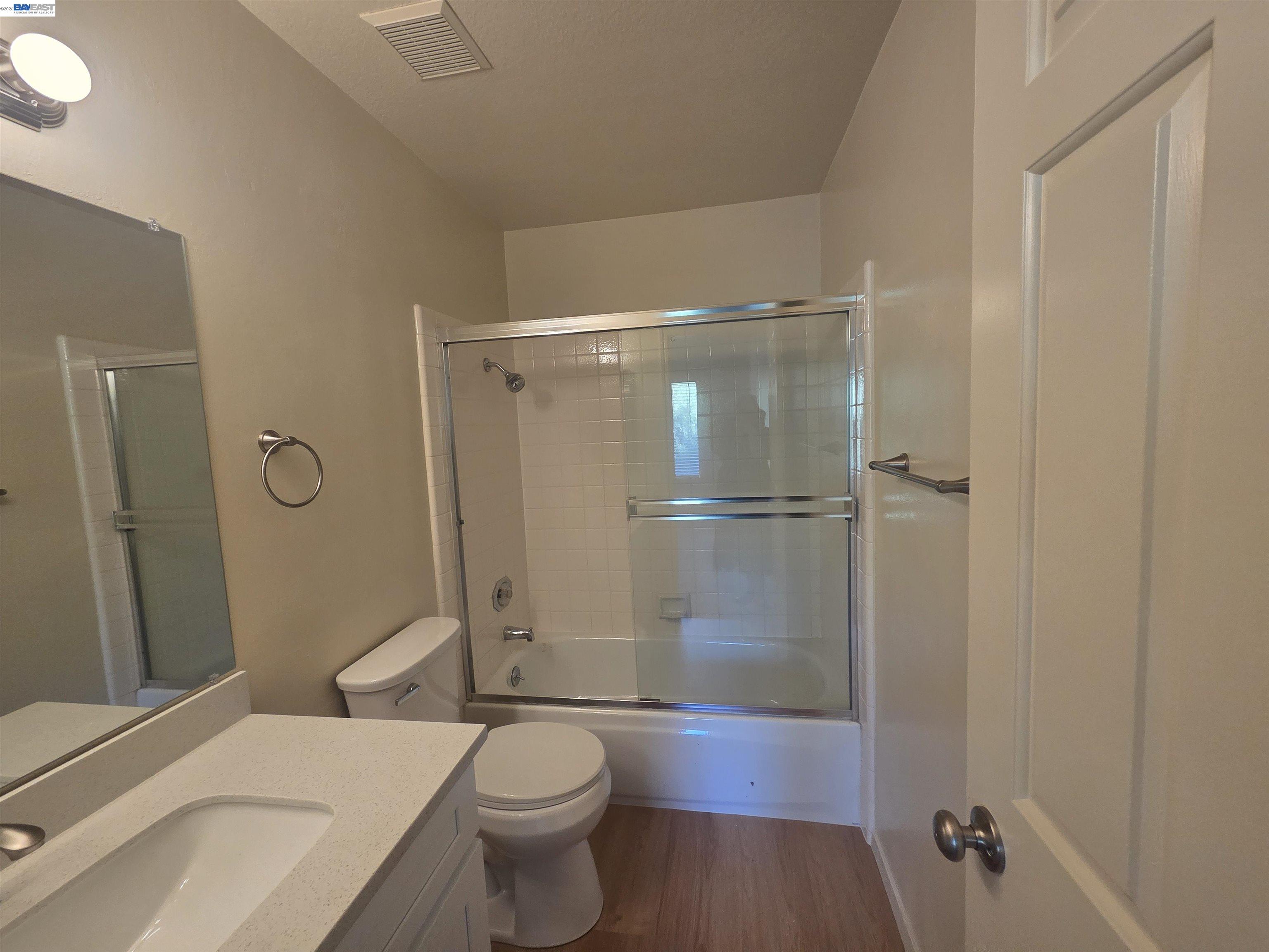 San Ramon San Ramon, CA 94582 - Photo 26 of 30 a bathroom with a granite countertop bathtub shower and toilet