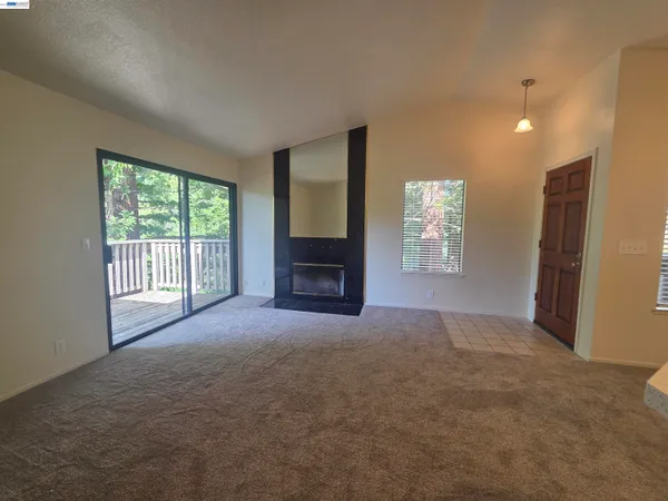 a view of empty room with front door