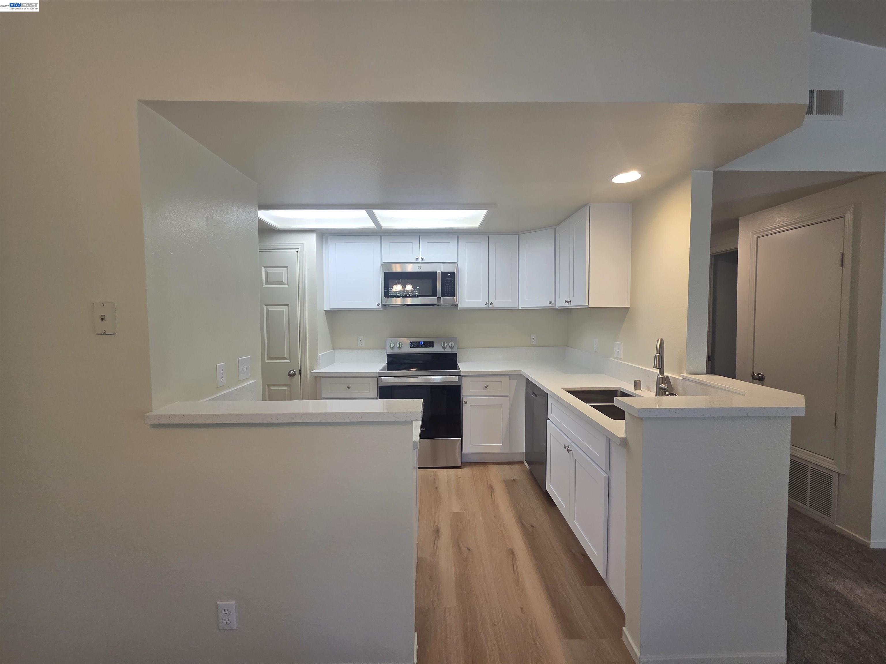 San Ramon San Ramon, CA 94582 - Photo 9 of 30 a kitchen with stainless steel appliances granite countertop a sink stove and refrigerator