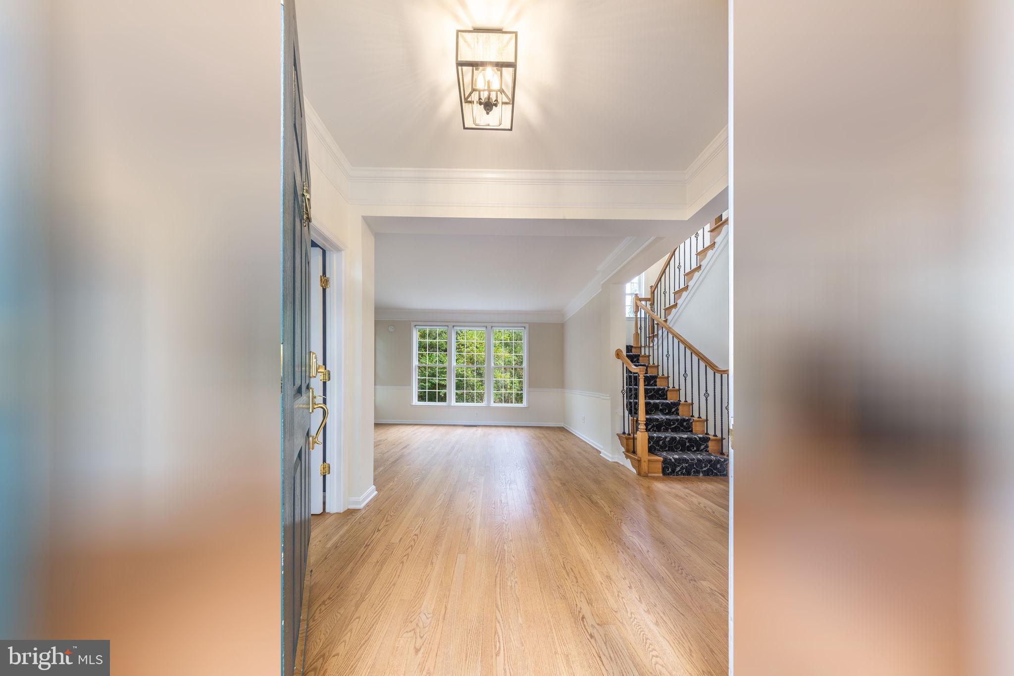 21934 Windover Drive Broadlands, VA 20148 - Photo 12 of 54 a view of entryway and hall with wooden floor