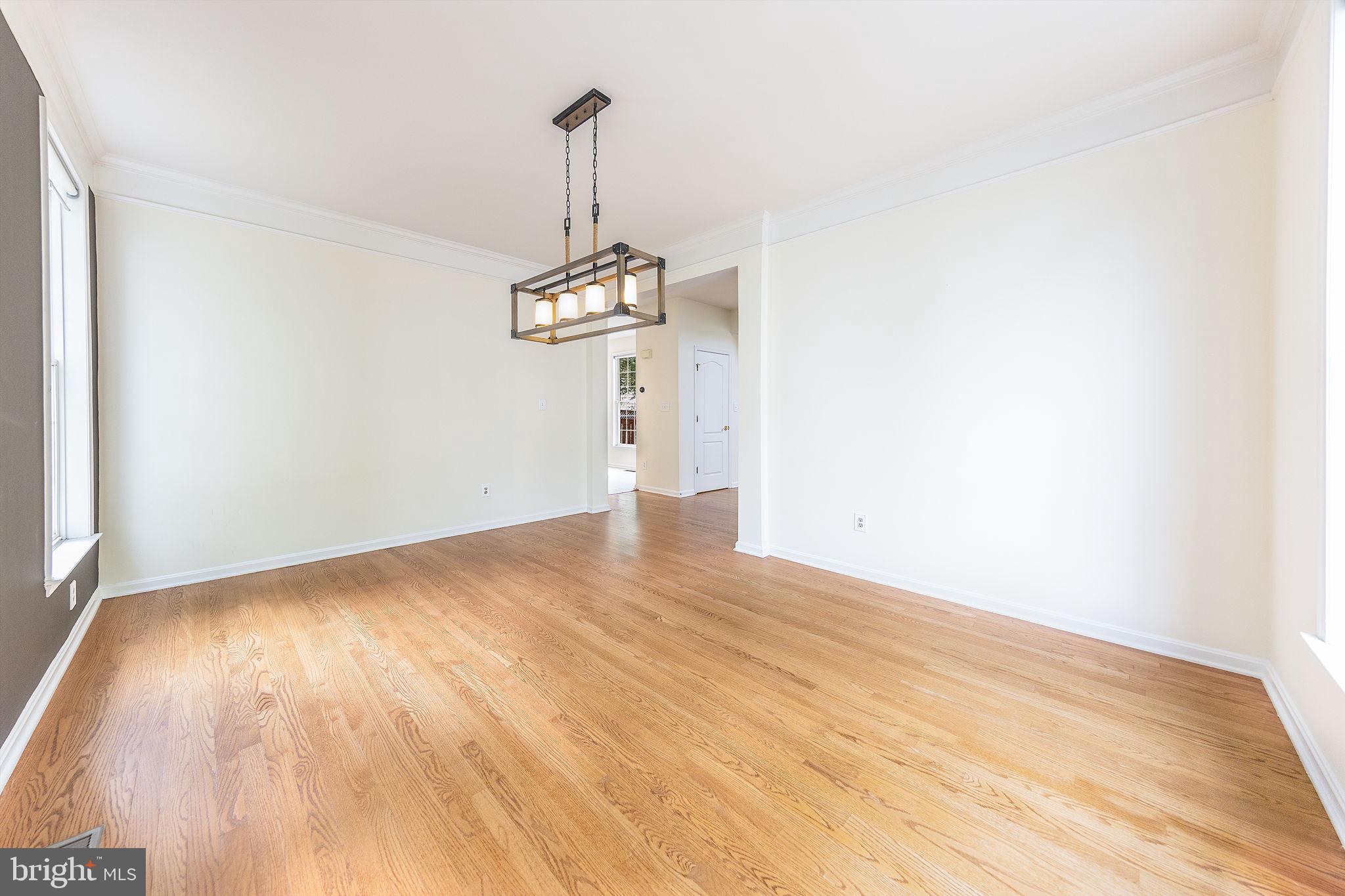 21934 Windover Drive Broadlands, VA 20148 - Photo 15 of 54 a view of empty room with wooden floor