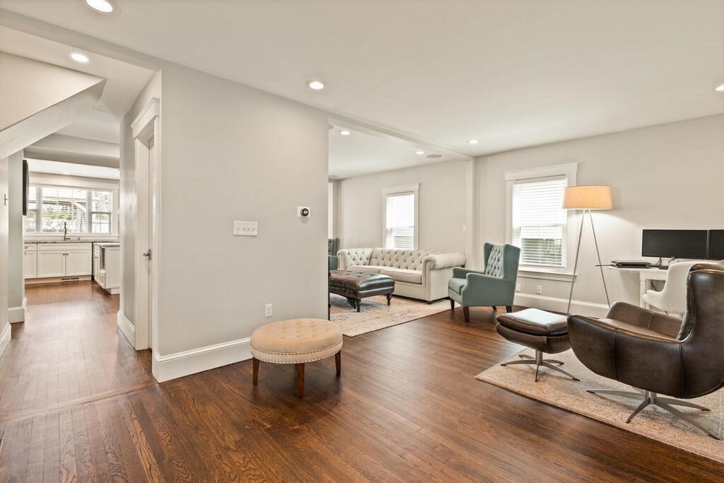 43 Guild Street Medford, MA 02155 - Photo 13 of 33 a living room with furniture and a wooden floor