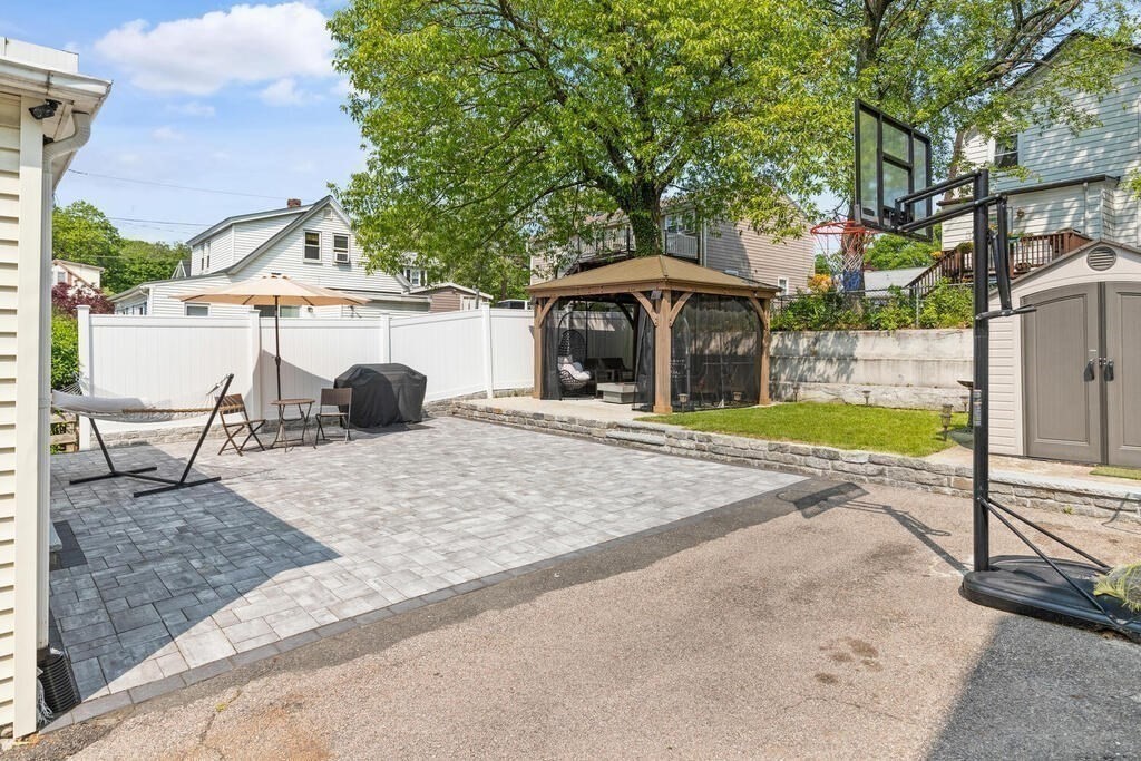 43 Guild Street Medford, MA 02155 - Photo 23 of 33 a view of a house with basketball court