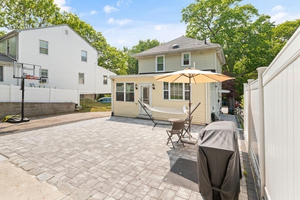 43 Guild Street Medford, MA 02155 - Photo 26 of 33 a view of a house with backyard and sitting area