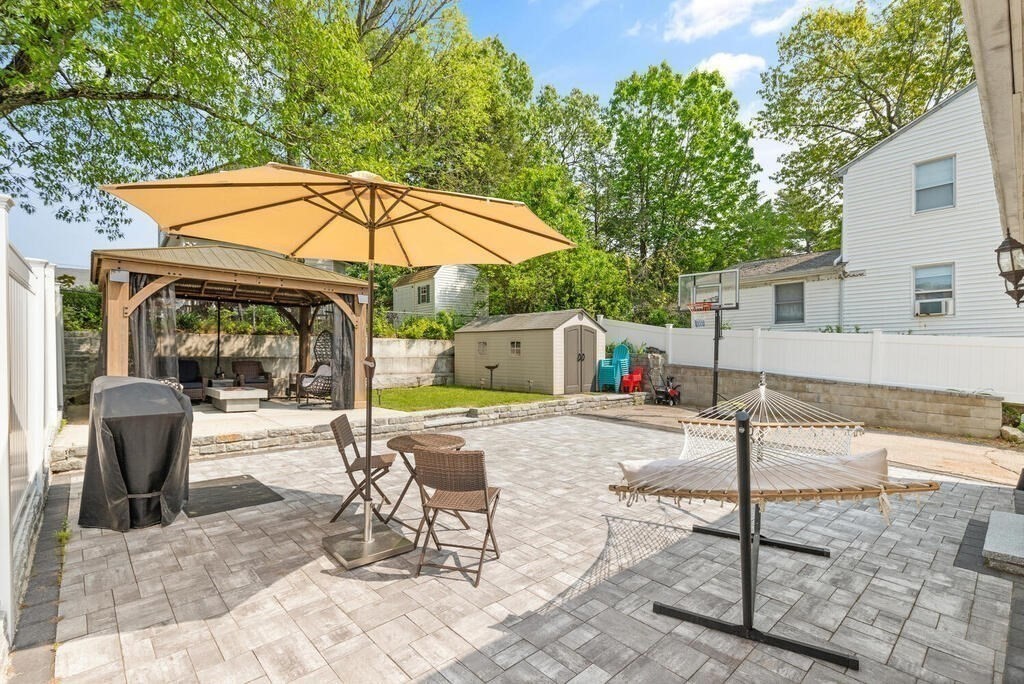 43 Guild Street Medford, MA 02155 - Photo 27 of 33 a view of a chairs and table in the patio