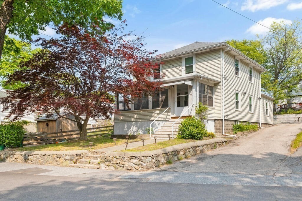 43 Guild Street Medford, MA 02155 - Photo 30 of 33 a front view of a house with a yard