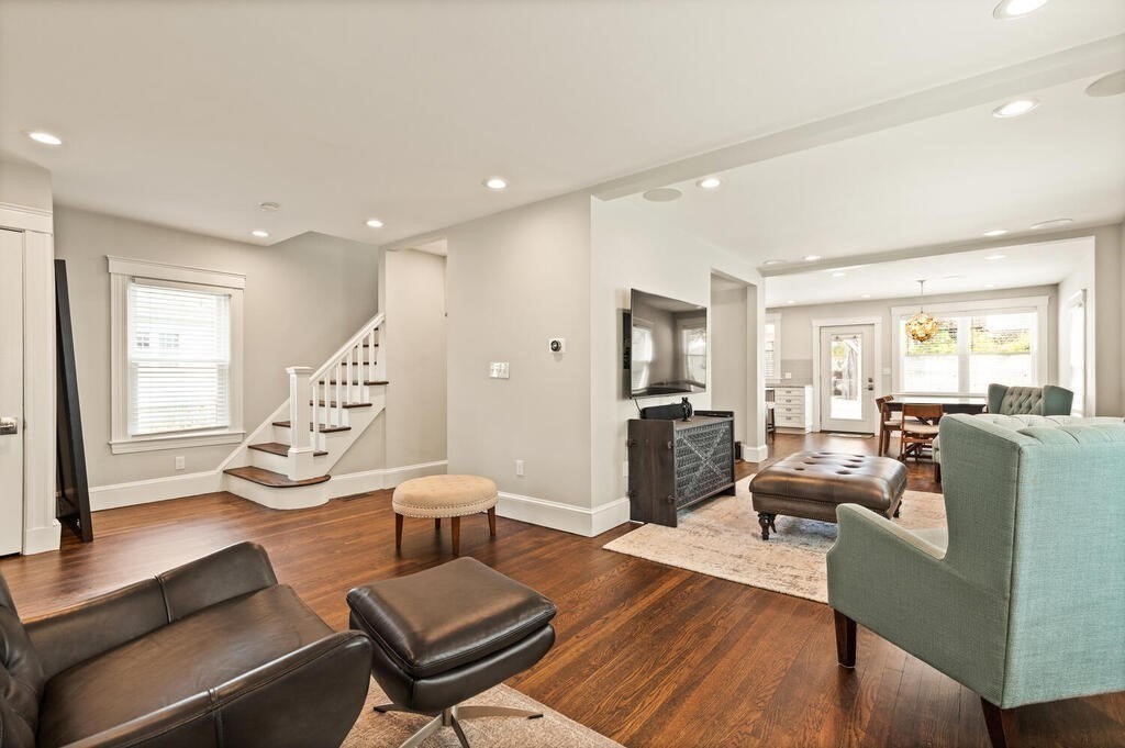 43 Guild Street Medford, MA 02155 - Photo 4 of 33 a living room with furniture or wooden floor and a large window